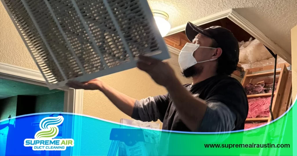 An image shows a technician removing the filter to assess the air ducts and overall HVAC system.