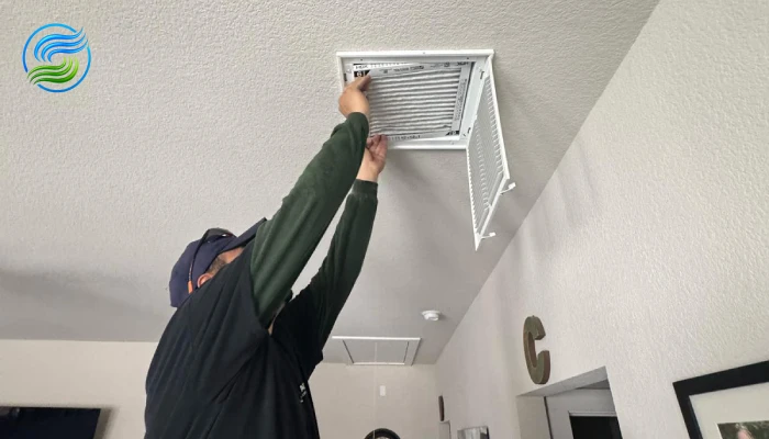 our technician replacing the air filter